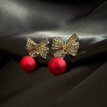 Je m'appelle Accessoires Rood/Goud / One Size Earrings Bow | Rood/Goud