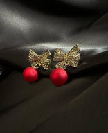 Je m'appelle Accessoires Rood/Goud / One Size Earrings Bow | Rood/Goud